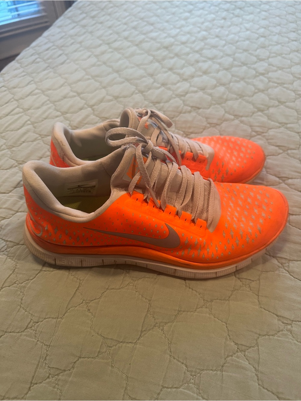 Nike Neon Orange Running Shoes with Light Gray Accents